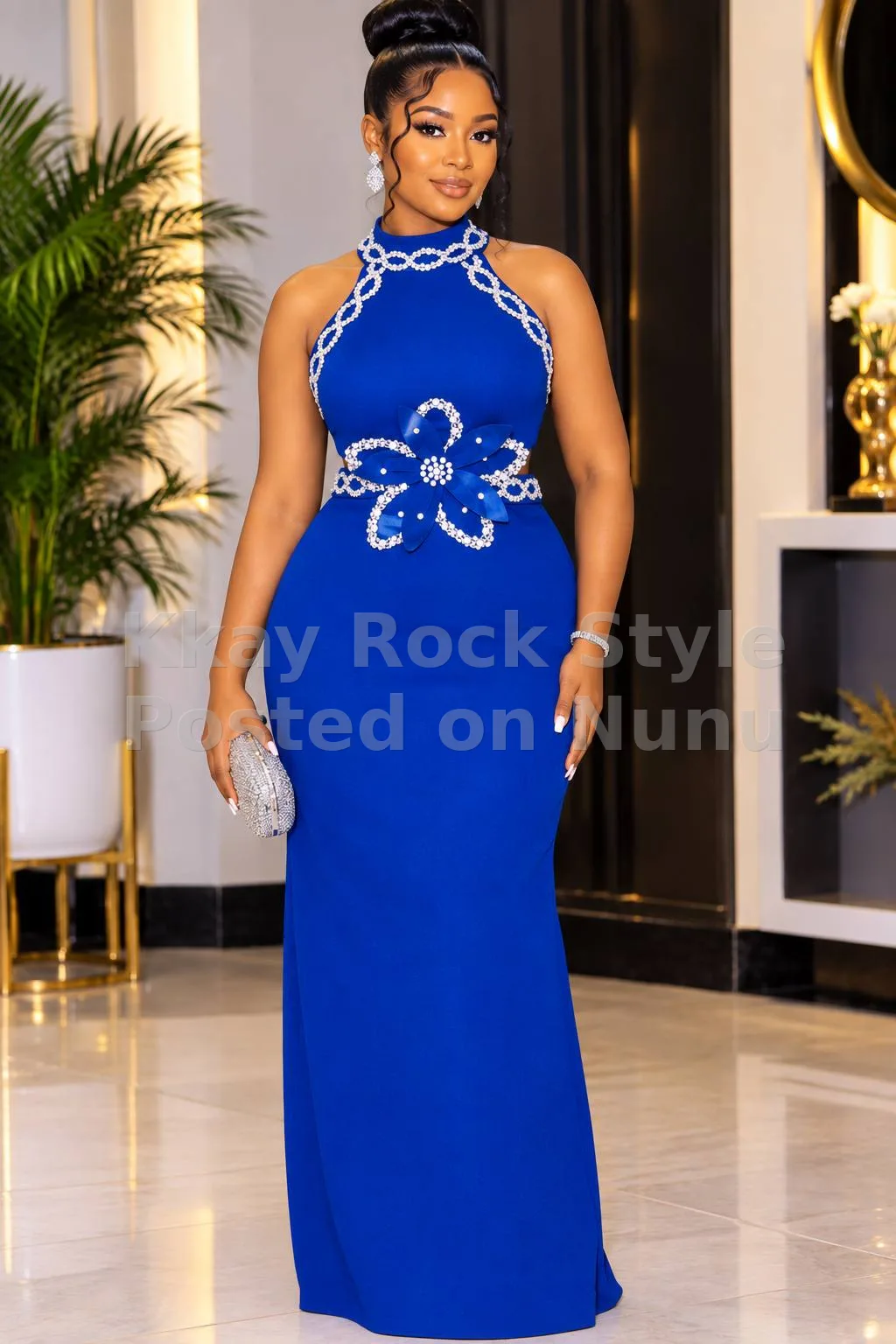 Glamours, bright royal blue dress.
