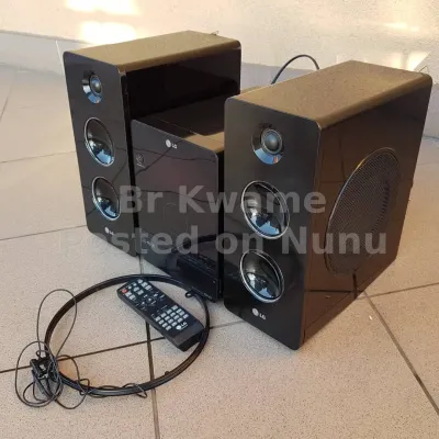 modern LG hifi machine with side and side woofer quality bass